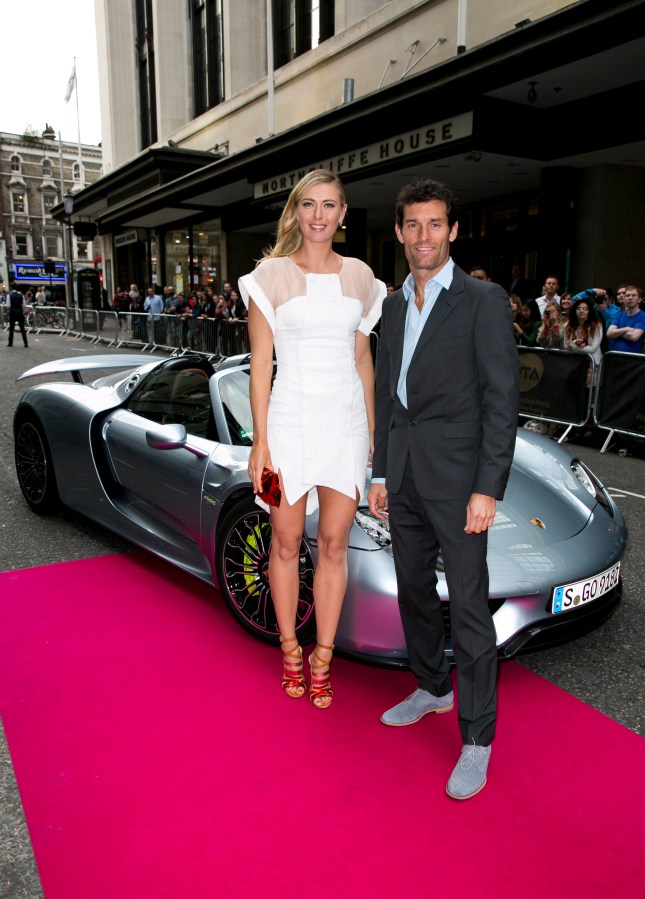 Porsche Brand Ambassadors Maria Sharapova and Mark Webber arrive with a Porsche 918 Spyder super sportscar for the WTA Pre-Wimbledon Party at Kensington Roof Gardens on June 19, 2014 in London, UK